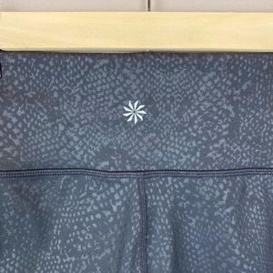 Athleta black embossed tonal snake print tight S